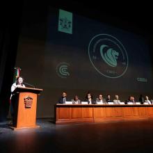 Doctora Carmen Rodríguez, haciendo uso de la voz durante el evento