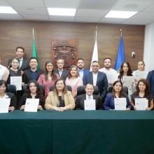 Participantes de la ceremonia de titulación