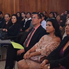 Publico sentado en el auditorio 